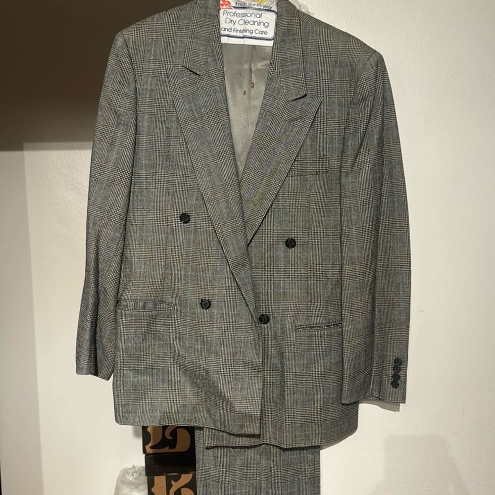 This is a 2 piece men suit in a size 38R/32R.